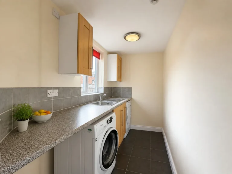 Shared utility/laundry room - serves Rooms 19-24